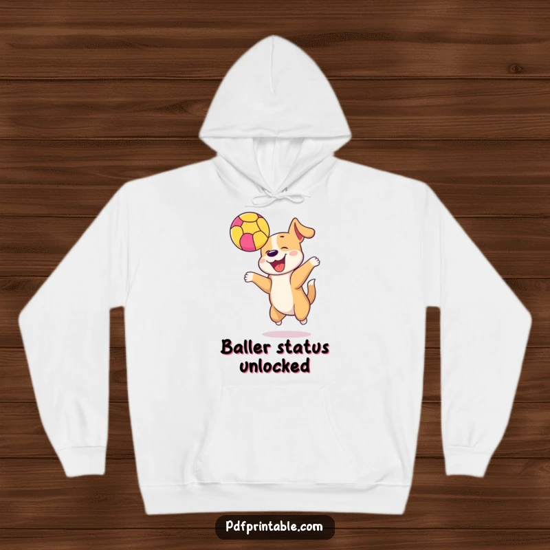 Funny happy dog bouncing a colorful ball high in the air, depicted on a cozy hoodie for playful comfort.