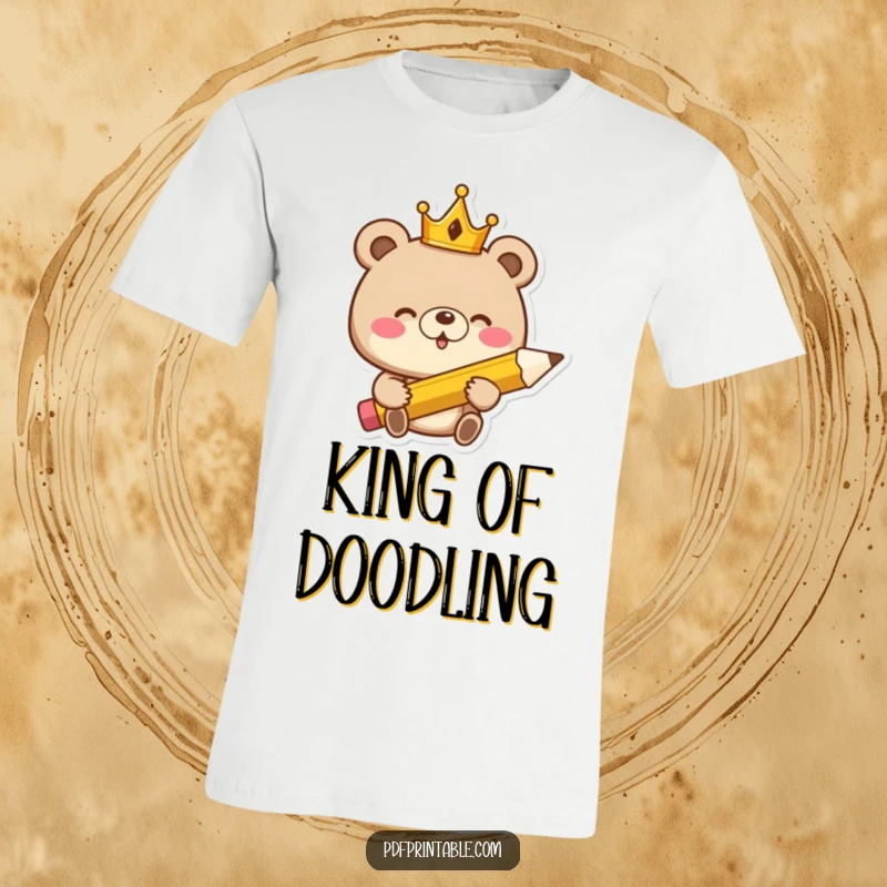 Funny T-Shirt: Giggling bear monarch wearing a crown clutches a massive pencil, ready for royal decrees and comedic writing.